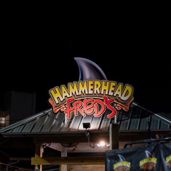 Hammerhead Fred's exterior sign at night, PCB Spring Break 2026