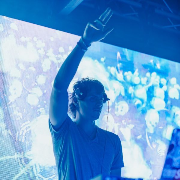 DJ against big LED screen, PCB Spring Break 2026