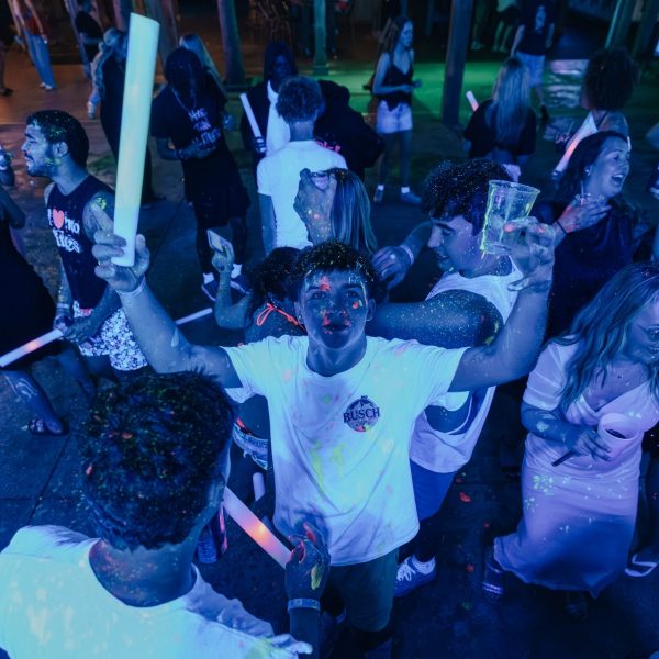 Glow-stick dance crowd, PCB Spring Break 2026