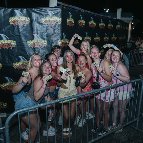 Group at Hammerhead Fred's backdrop, PCB Spring Break 2026