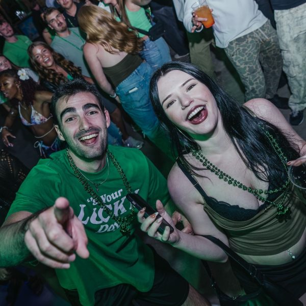 Couple in green, PCB Spring Break 2026