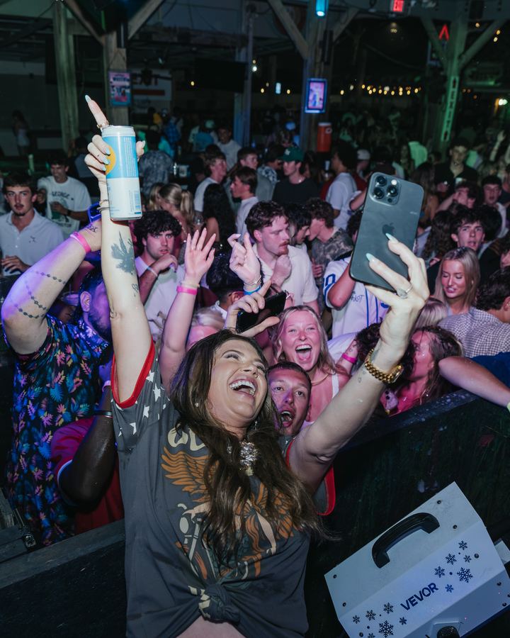 Crowd and dancers at a Spring Break party